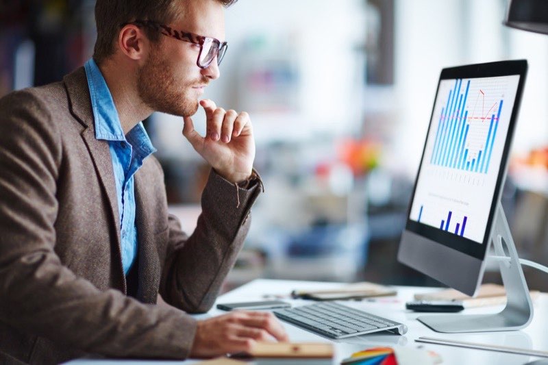 STAX advisor reviewing market data